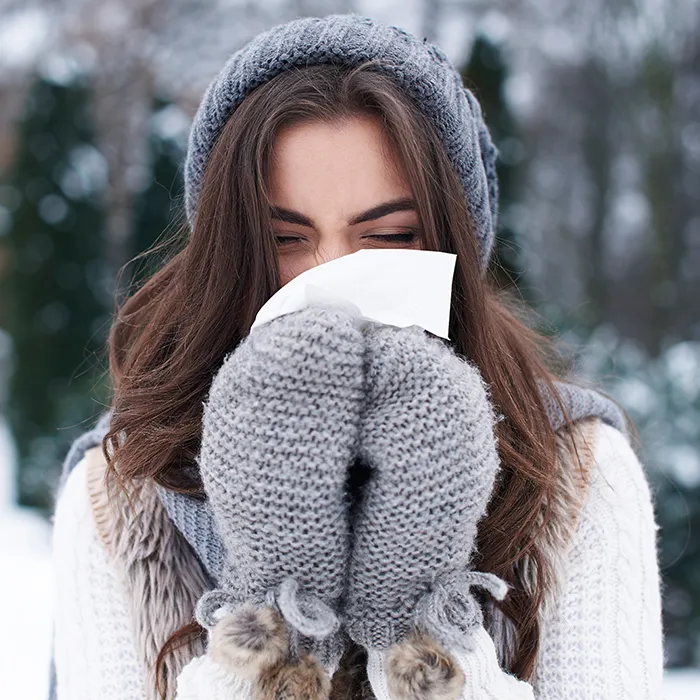 Femme rhume hiver